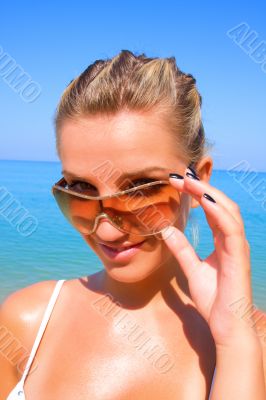 Sexual young girl Relaxing on a beach