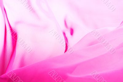 Beautiful background, flying pink fabric