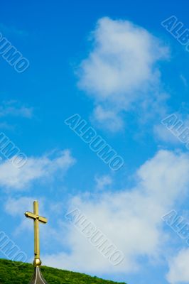 Church cross against the sky