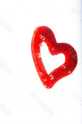 Valentine with red heart in water