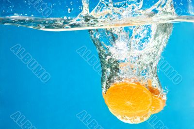 Orange SPLASHING IN WATER 