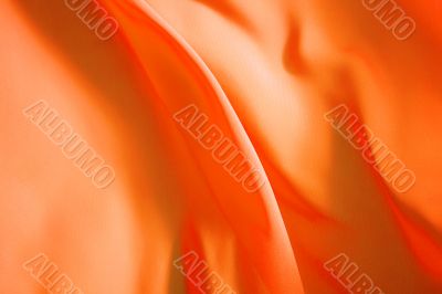 Beautiful background, flying orange fabric