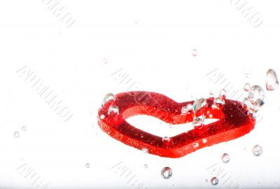 Valentine with red heart in water