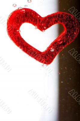 Valentine with red heart in water