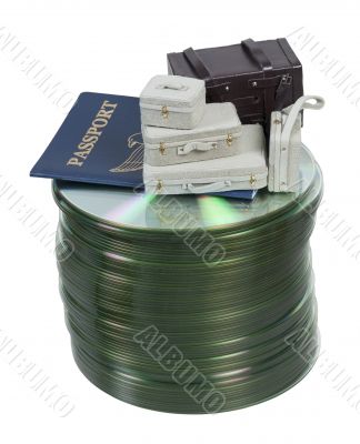 Suitcases and Passport on Computer Disks