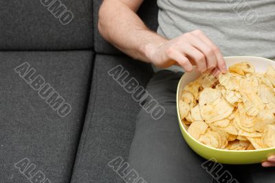 Man eating chips