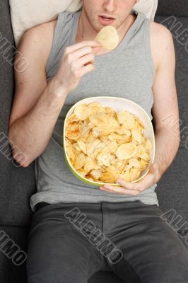 Man eating chips