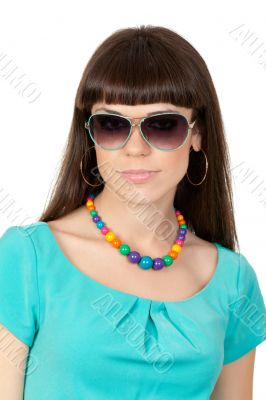 Portrait of an attractive young woman in sunglasses.