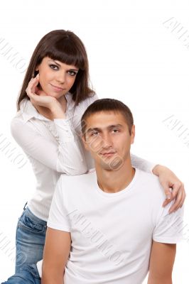 Portrait of a loving couple in the studio on a white