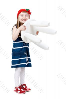 little girl with a white chair in the hands of