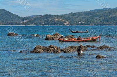 Thai fishermen catch fish