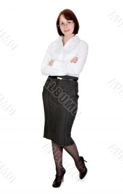 Young business lady in spectacles in the studio