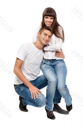 Young beautiful couple isolated on white background