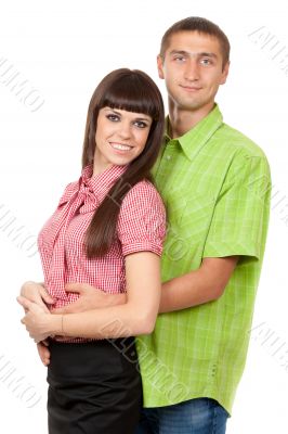 Family portrait, couple in love in the color clothes on a white 