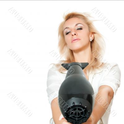 Blonde girl with hair dryer