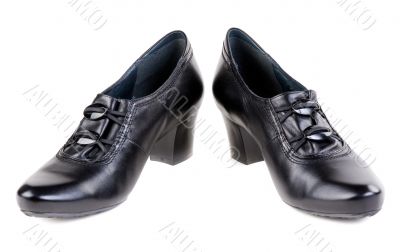 A pair of black women`s shoes