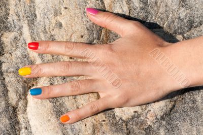 Female hand with colorful trendy manicure