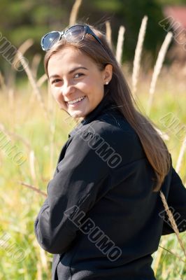 Portrait of a girl in the ears of sunglasses