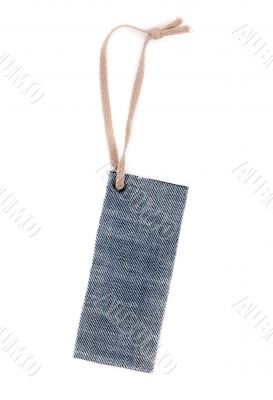 Blank denim label with rough rope