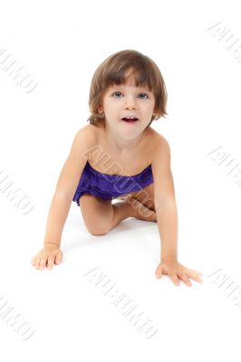 Little girl crawling on the floor