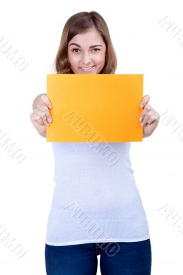 Beautiful girl with a yellow sheet of paper winks