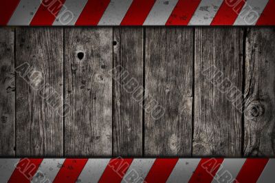 wooden background with warning bars
