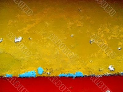 Peeling paint on rusted metal surface