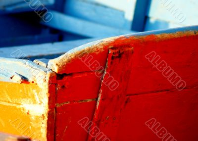 Peeling paint on rusted metal surface