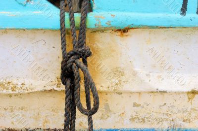 Peeling paint on rusted metal surface