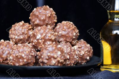 Brown sweet candy on black background