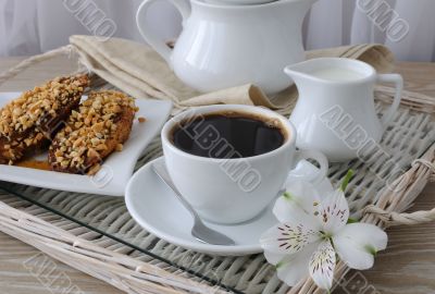 French toast with walnuts and cinnamon and a cup of coffee