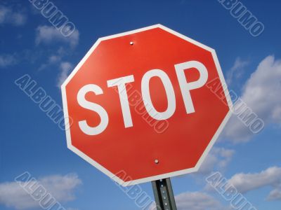 Stop Sign Against Sky