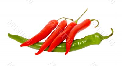 red pepper chile on green pepper