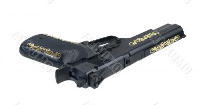 Hand Gun with Golden Accents