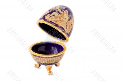 Casket in the form of an Easter egg with an ornament.ggggggggggg