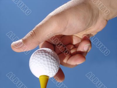 Hand and Golf Ball