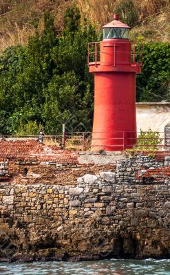 small red lighthouse
