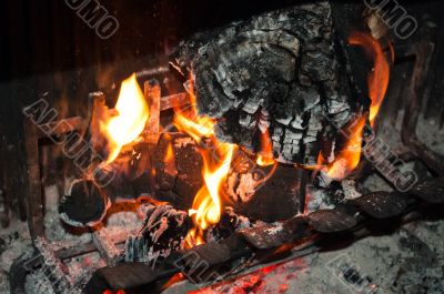 Burning woods in fireplace