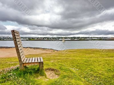 Wooden bench on a river