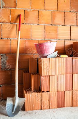 Masonry Shovel bucket and bricks