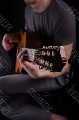 Nice bald guy with a guitar