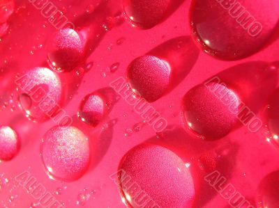 Drops of water in red