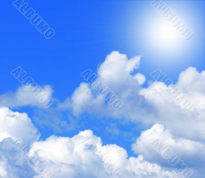Sun in a blue cloudy sky