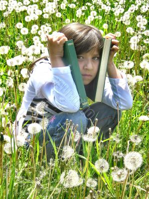 Schoolgirl with books looks tied