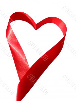 Heart made of red silky ribbon