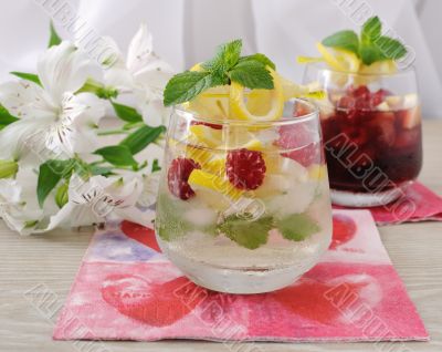 Fresh homemade lemonade with mint and raspberries