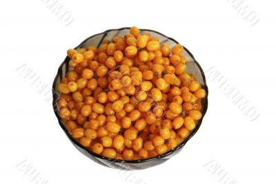 Ð’erries  sea-buckthorns in a glass vase on a white background