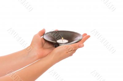 Candle in the hands