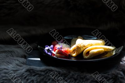 Pancakes, strawberries and cream