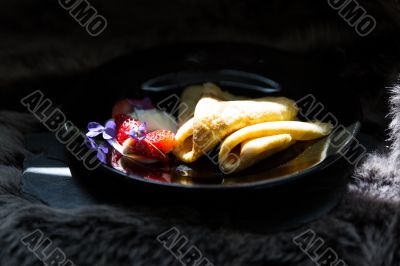 Pancakes, strawberries and cream